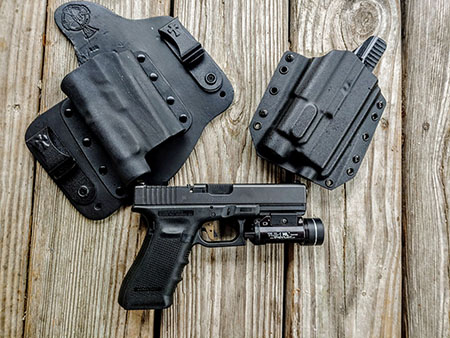 Concealed carry holsters with lights