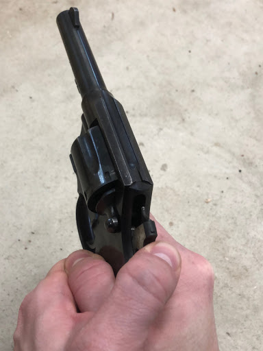 Proper way to grip a revolver and pull the hammber down.
