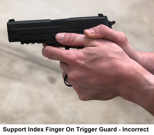 Placing your support index finger on trigger guard is incorrect.