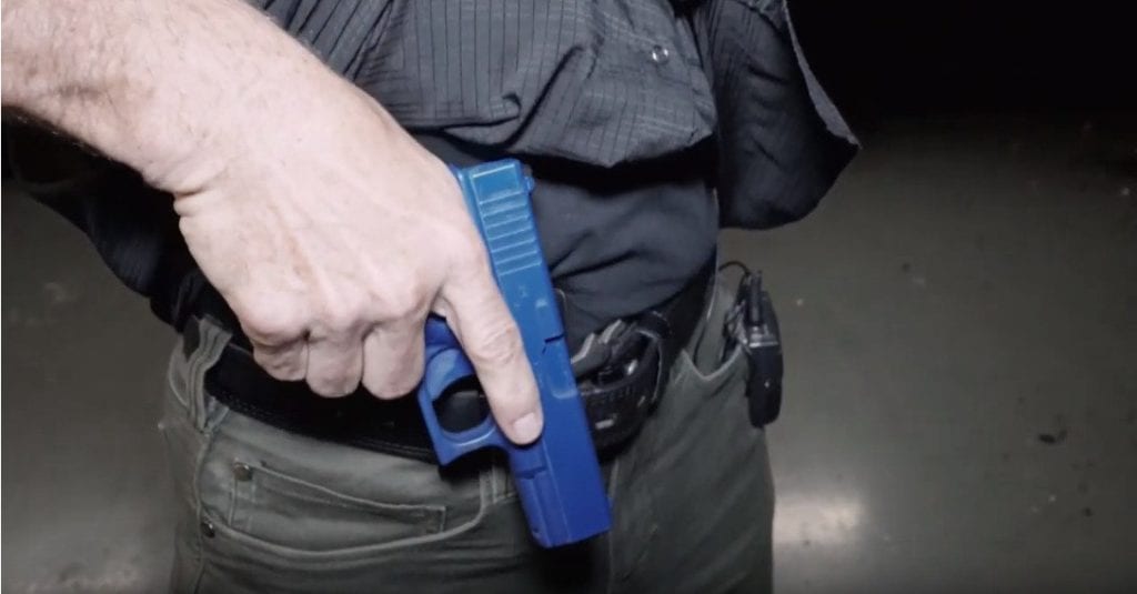 Practicing your draw from concealment with a blue gun
