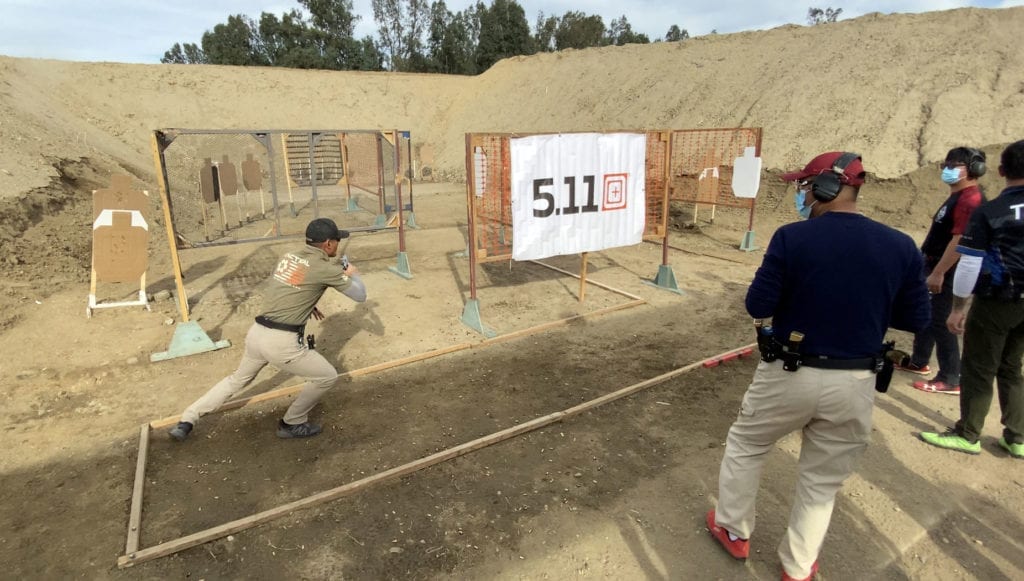 Myles competes at a USPSA match.